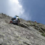 Neus escalando el L2, Xavi asegurando